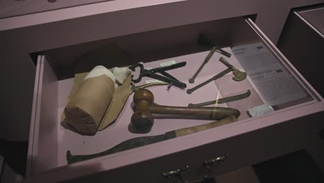 Historical-chocolate-making-tools-displayed-in-a-drawer-exhibit-at-Zagreb's-Chocolate-Museum