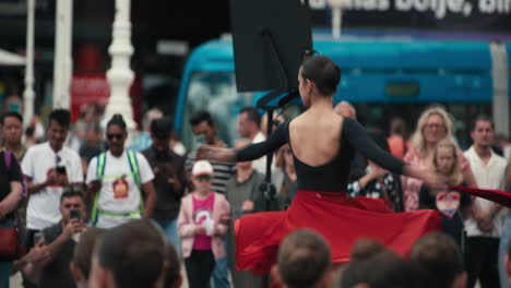 Ballet-dancer-in-a-black-and-red-costume-performing-in-front-of-an-audience-at-Zagreb's-Cest-is-d'Best-street-festival