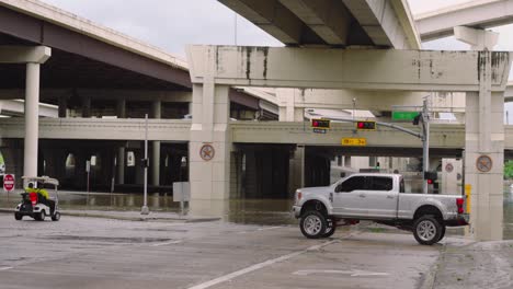 Establishing-shot-of-flooded-waters-at-I-10-West-underpass-after-Hurricane-Beryl-hits-Houston