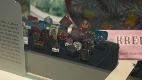 Collection-of-vintage-chocolate-brand-pins-displayed-at-Zagreb's-Chocolate-Museum