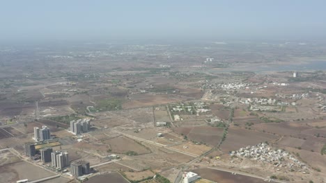 The-entire-Rajkot-is-visible-inside-the-drone-camera,-including-many-high-rise-buildings