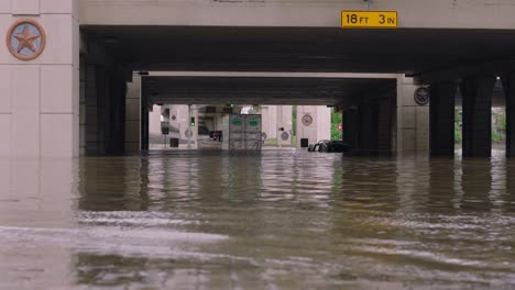 Establishing-shot-of-flood-waters-at-I-10-West-underpass-in-Houston,-Texas