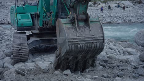 excavator-operating-near-a-river