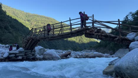 river-with-a-village-bridge