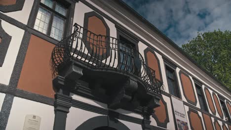 Close-up-of-Sermage-Palace's-ornate-balcony-and-baroque-facade,-Varazdin-Croatia