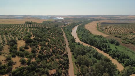 Aerial-view-of-a-road-beside-a-river