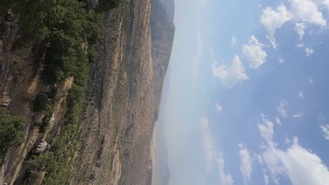 Riding-a-chairlift-down-Korek-Mountain-near-Rawanduz,-Kurdistan-Iraq---vertical-orientation