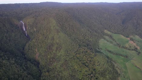 Green-Mountains-And-Wairere-Falls-In-North-Island,-New-Zealand---Aerial-Drone-Shot