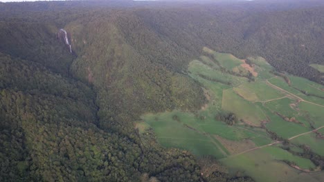 Scenic-Mountains-Surrounding-Wairere-Falls-In-New-Zealand---Aerial-Drone-Shot