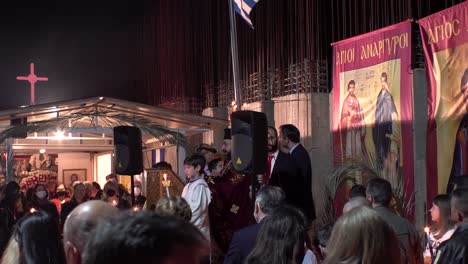 Crowd-gathered-to-celebrate-the-resurrection-of-Christ,-at-small-orthodox-church-in-Greece