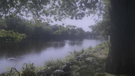 Wide-shot-of-the-Old-Town-waterfront-looking-towards-bridge-crossing-river