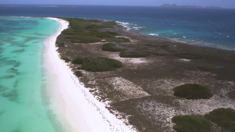 Crasky-beach-with-turquoise-waters-and-white-sand-in-los-roques,-aerial-view