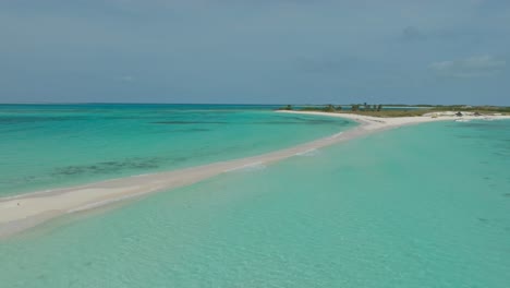 Fast-sideways-drone-shot-over-the-landbridge-at-Cayo-Agua-in-Venezuela