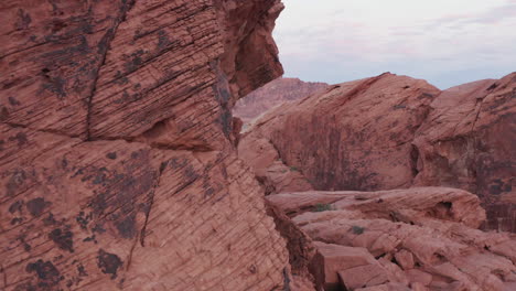 Revealing-shot-of-the-landscape-Red-Sandstone-in-Nevada