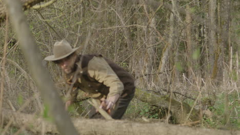 Cowboy-finding-his-way-through-the-jungle,-wasteland