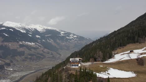 A-alpine-retreat-high-in-the-Austrian-Alps-called-steinerkogl-offering-panoramic-views-of-a-picturesque,-snow-covered-valley-and-a-charming-village-below-known-as-mayrhofen