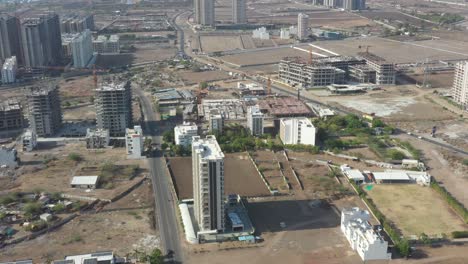 Drone-camera-showing-many-different-construction-sites-going-on