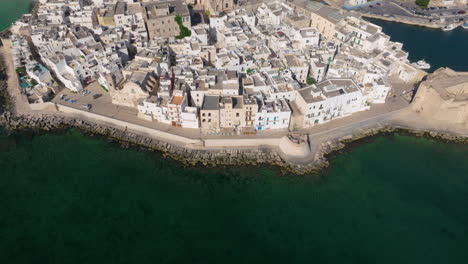 Aerial-View-Of-Monopoli-Town-On-The-Coast-Of-Mediterranean-Sea-In-Puglia,-Italy