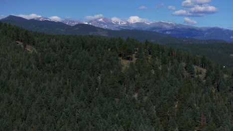 Spring-Summer-Mount-Blue-Sky-Evans-aerial-drone-Conifer-Evergreen-Colorado-snowmelt-sunny-morning-Rocky-Mountains-landscape-North-Turkey-Creek-Marshdale-Forest-Open-Space-forward-upward-reveal-motion