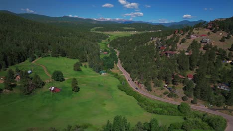 Mount-Blue-Sky-Evans-aerial-drone-Conifer-Evergreen-Colorado-Rocky-Mountains-landscape-Spring-Summer-North-Turkey-Creek-Road-Traffic-Marshdale-sunny-morning-circle-left-motion