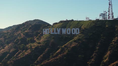 Amazing-Aerial-View-Above-Hollywood-Sign-in-Los-Angeles,-California-on-Beautiful-Summer-Day