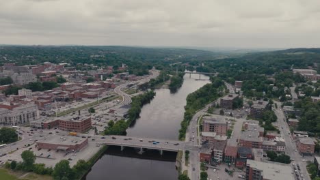 Magog-River-Flowing-Through-Downtown-Sherbrooke-In-Canada---Aerial-Drone-Shot