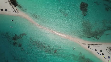 Sandy-path-surrounded-by-turquoise-water-at-cayo-de-agua,-los-roques,-aerial-view