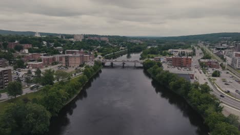 Tranquil-Magog-River-In-Sherbrooke,-Canada---Aerial-Drone-Shot