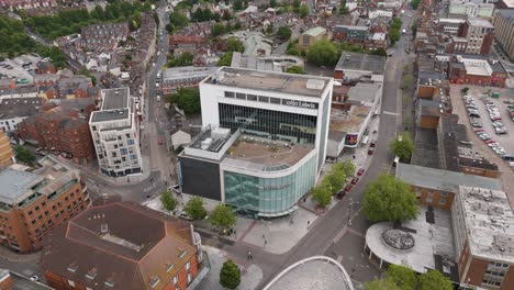 Aerial-view-of-the-prominent-John-Lewis-store-situated-in-the-heart-of-Exeter,-Devon,-UK,-July-2024