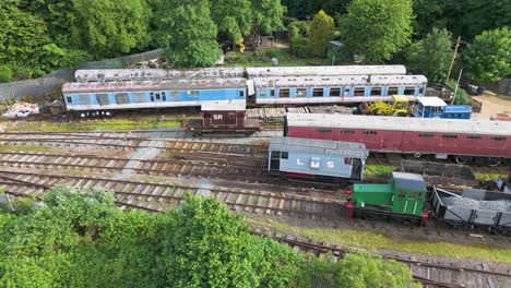 Aerial-view-looking-down-over-Northamptonshire-ironstone-locomotive-station-maintenance-yard-trucks