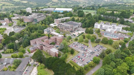 Aerial-of-the-Armory,-Harrison,-Innovation-Centre-and-South-West-Institute-of-technology-at-Exeter-University,-Devon-UK-July-2024