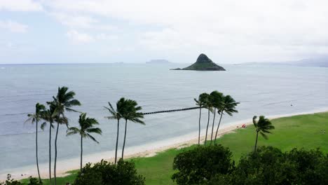 Drone-shot-over-Kualoa-Regional-Park-flying-out-to-China-Man-Hat-Island