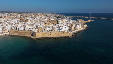 Aerial-View-Of-The-Old-Town-Of-Monopoli-In-Italy-At-Daytime---Drone-Shot