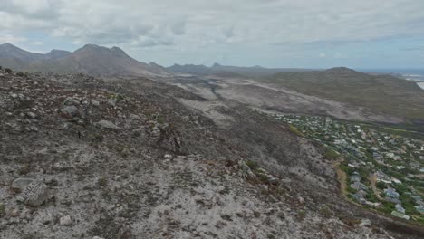 Drone-shot-of-the-burned-down-mountains-near-Cape-Town-after-a-summer-wild-fire