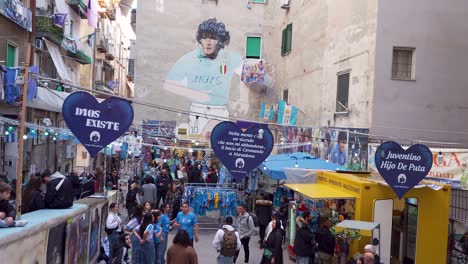 Mural-graffiti-art-of-Diego-Armando-Maradona-in-Quartieri-Spagnoli-after-the-victory-of-the-Italian-serie-A-league---Naples,-Italy