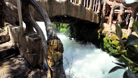 Bekhal-waterfall-and-resort-flowing-out-of-the-mountain-near-Rawanduz,-Kurdistan-Iraq---isolated-close-up