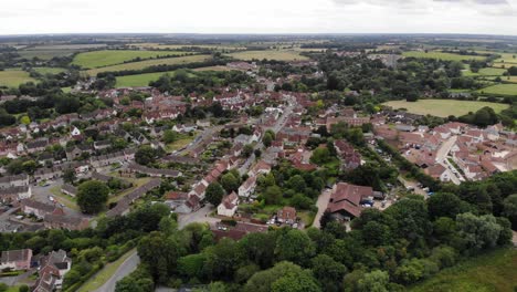 Static-drone-shot-of-Lavenham-which-is-a-well-preserved-medieval-village-in-Suffolk,-UK