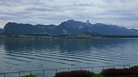 Static-shot-of-Swiss-alps-from-lake-Thun