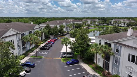 Aerial-approaching-shot-of-housing-area-in-american-suburb-with-luxury-apartments-homes