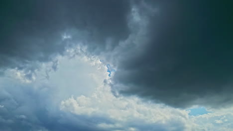 Sky-only-dark-clouds-gathering-before-a-rainstorm---time-lapse-background-layer