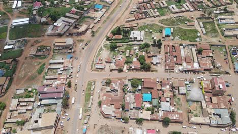 Panorama-of-developing-African-village-Loitokitok-Kenya,-aerial-top-down