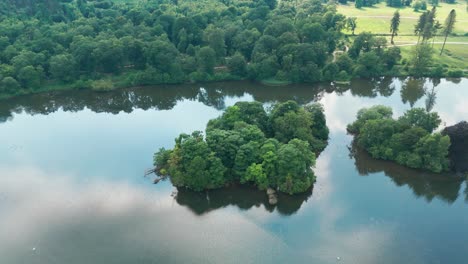 Dense-Vegetations-Over-Tranquil-Waters-Of-Trentham-Gardens-Lake,-Stoke-On-Trent-In-England,-UK