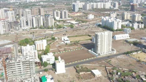 Drone-is-heading-towards-Camera-Sahib-where-high-rise-buildings-are-visible-in-the-distance