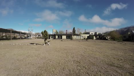 Fpv-Drone-View-Of-Tourist-Complex-Of-Cabins-In-Tafí-Del-Valle,-Tucumán,-Argentina