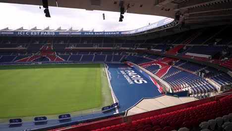 Soccer-stadium-Side-view-at-Parc-des-Princes-home-of-Paris-Saint-Germain-Football-team,-Aerial-dolly-left-shot