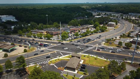 Motion-Timelapse-Of-Traffic-On-Road-Intersection-In-Marietta,-Georgia