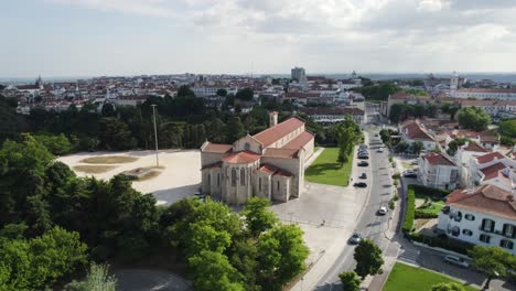 Aerial-view-of-Igreja-de-Santa-Clara-in-Santarém,-Portugal,-showcasing-the-church-and-surrounding-cityscape