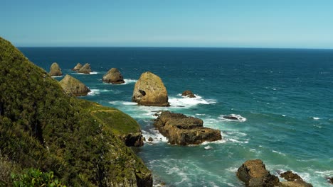 Static-shot-of-the-Nuggat-Point-in-Catlins,-New-Zealand-on-a-sunny-day-with-blue-sky