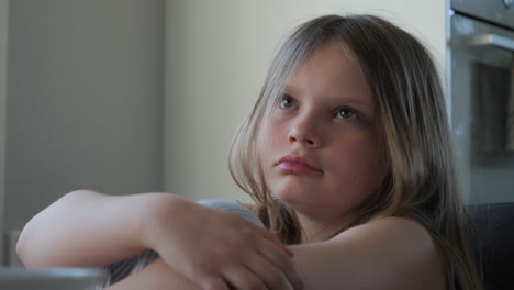 Sad-Blonde-Girl-Indoors-by-Window-Portrait-Slow-Motion