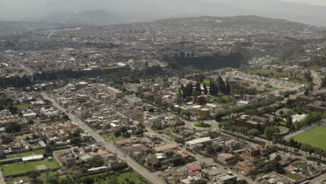 Panoramic-drone-shot-of-the-city-Ibarra,-Ecuador